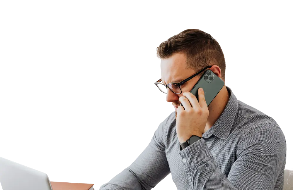 Local SEO Services - Man on Phone with Laptop - Web Design and SEO Company Limited