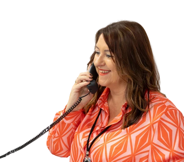Sue, website project manager at the Web Design and SEO Company, speaking on the phone